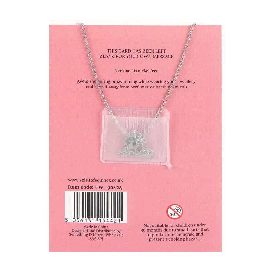 Collier lune de quartz rose sur carte de vœux