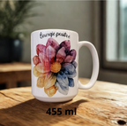 “Mug blanc décoré d’une fleur colorée et du message Énergie positive.”