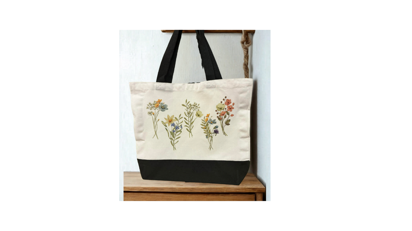 Sac réutilisable (Tote bag) décoré de fleurs colorées alignées sur la partie supérieure.