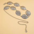 Ceinture concho ovale gravé de fleurs