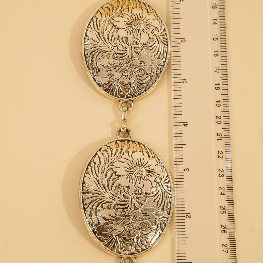 Ceinture concho ovale gravé de fleurs