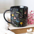 Mug à motif floral folk noir