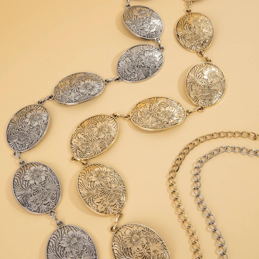 Ceinture concho ovale gravé de fleurs